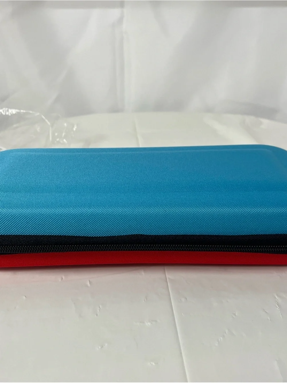 Blue and Red Two-Tone Nintendo Switch 2 carrying case with Zipper